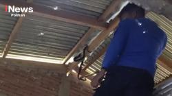 Ular Hitam Muncul di Lingkungan Pesantren, Damkar Polewali Mandar Lakukan Evakuasi