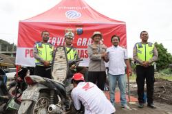 Pulihkan Kendaraan Korban Banjir, Polres Tapteng Buka Layanan Servis Motor Gratis