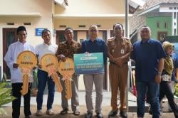 Warga Jenggawah Terima Bantuan Perbaikan Rumah dan Sarana Lingkungan