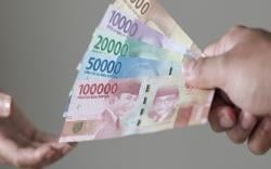 BI Tegaskan Pembayaran Tunai Tidak Boleh Ditolak, QRIS Hanya Sarana Transaksi