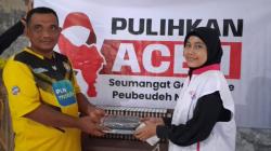 Terjang Lumpur, Relawan AQL Salurkan Wakaf Al-Qur'an untuk Korban Banjir Aceh Tamiang