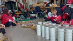 Pramuka Peduli Kwarcab Kota Tangerang Siapkan Paket Nasi untuk Warga Terdampak Banjir