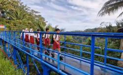 Jembatan Merah Putih Presisi Bikin Warga dan Siswa Sekolah Desa Wagir Lor Ponorogo Tersenyum