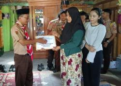 Salut! Anggota Pramuka Kwarran Tawangharjo Gotong Royong Bantu Korban Kebakaran Plosorejo