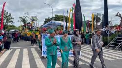 Dinas Kehutanan dan DLH Kalteng Tampil Memukau di Karnaval Festival Budaya Isen Mulang 2026