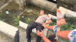 Viral! Diduga Selingkuh, Oknum Polisi Polrestabes Medan Dikejar Anak-Istri hingga Nyemplung ke Kolam