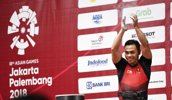 Angkat Besi Atlet angkat besi Indonesia, Eko Yuli, tubuhnya lebih berbentuk berkat olahraga yang dia geluti. (Foto: REUTERS/Edgard Garrido)