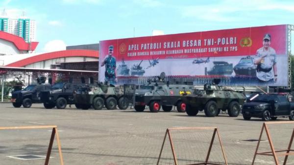 Apel Patroli Skala Besar TNI-Polri dalam rangka menjamin keamanan masyarakat sampai sampai ke TPS, di JIE Expo Kemayoran, Jakarta Pusat, Minggu (14/4/2019). (Foto: iNews.id/Ilma de Sabrini)