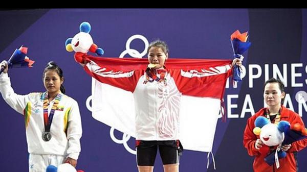 Windy Cantika Aisah Lifter Windy Cantika Aisah berhasil meraih medali emas pada cabang olahraga (cabor) angkat besi kelas 49 kg, Senin (2/12/2019).