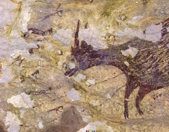 Lukisan yang ditemukan di Gua Bulu Sipong 4, Sulsel, disebut sebagai karya seni figuratif tertua di dunia berusia 44.000 tahun (Foto: AFP)