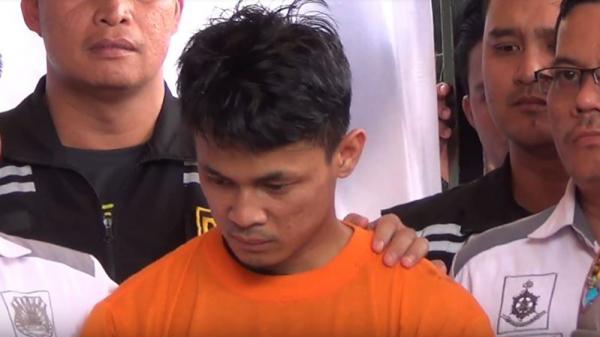 Tersangka RF, pelaku pembunuhan hakim PN Medan. (iNews/Aminoer Rasyid)