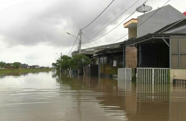 Perumahan Garden City Tangerang Banjir Perumahan Garden City Tangerang Banjir, Minggu (23/2/2020) (Foto: iNews/Sukron)