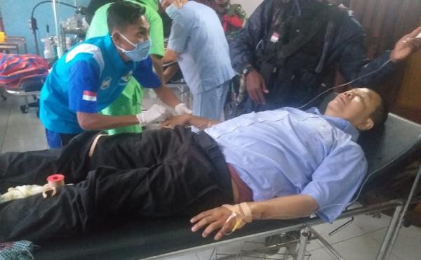 Kondisi terkini anggota TGPF Intan Jaya, Bambang Purwoko yang ditembak KKB usai melakukan olah TKP di Hitadipa, Jumat (9/10/2020). (Foto: TNI)