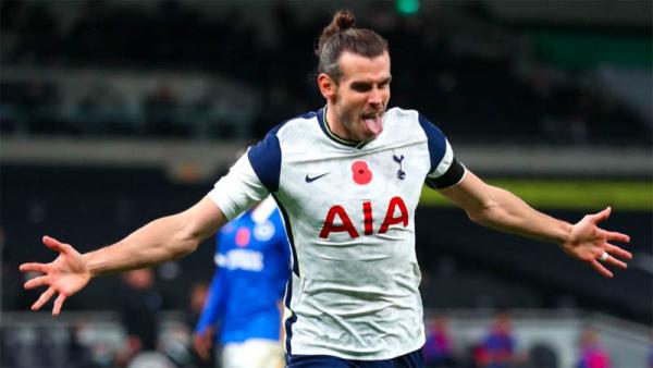 Penyerang Tottenham Hotspur Gareth Bale merayakan kemenangannya ke gawang Brighton & Hove Albion pada pekan ketujuh Premier League di Tottenham Hotspur Stadium, Senin (2/11/2020) dini hari WIB. (Foto: Premier League)