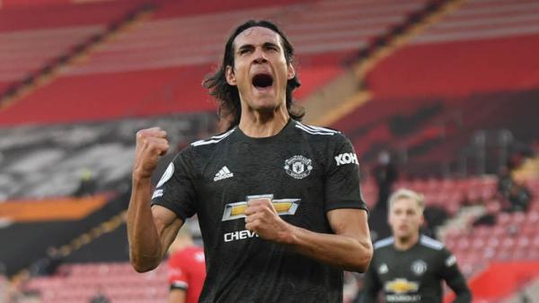 Cavani Striker Manchester United Edinson Cavani merayakan golnya ke gawang Southampton pada pekan kesepuluh Premier League di St Mary`s Stadium, Minggu (29/11/2020). (Foto: REUTERS)