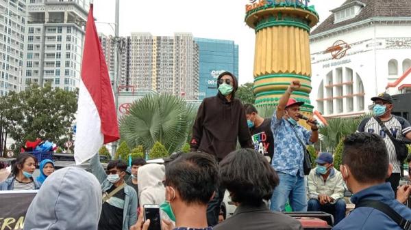 Massa GPB menggelar demo penolakan kedatangan Habib Rizieq Shihab ke Kota Medan, Selasa (1/12/2020). (Foto: iNews/Adi Palapa Harahap)