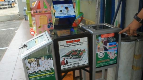 Kotak amal yang berada di mini market daerah Lampung (Andres Afandi/iNews)