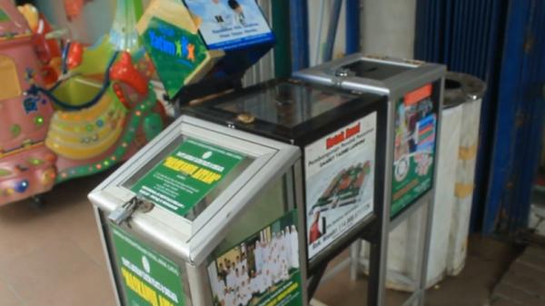 Kotak amal-2 Kotak amal yang berada di mini market daerah Lampung (Andres Afandi/iNews)