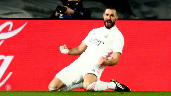 Real Madrid Karim Benzema Striker Real Madrid Karim Benzema merayakan golnya ke gawang Athletic Bilbao pada lanjutan Liga Spanyol di Estadio Alfredo di Stefano, Rabu (16/12/2020) dini hari WIB. (Foto: REUTERS)