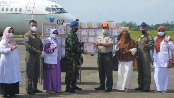 Paket rendang yang dikirim untuk korban bencana di Mamuju (Rus Akbar/iNews)