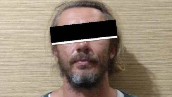 Dimitri Anokh (42), WNA Rusia yang memalsukan surat hasil tes PCR saat hendak masuk ke Bali. (Foto: SINDONews/Chusna M)