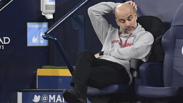 Pep Guadiola Man City Pelatih Manchester City Pep Guardiola bereaksi saat timnya kalah 0-2 dari Manchester United pada pekan ke-27 Liga Inggris 2020/2021 di Etihad Stadium, Minggu (7/3/2021) malam WIB. (Foto: REUTERS)