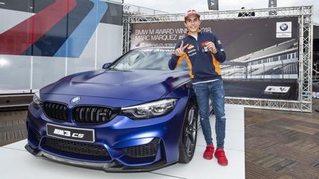 Marc Marquez 5 Marc Marquez di depan BMW M3 CS.