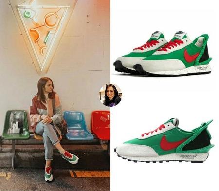 Enzy memakai Nike X Undercover Daybreak.