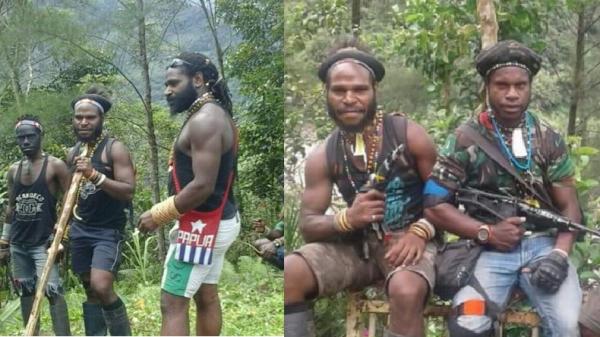 Anggota KKB Mairon Tabuni bergaya angkat senjata. (Foto: Istimewa).