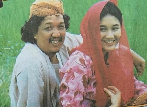 Nike Ardilla berkerudung.