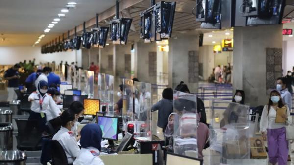 Suasana bandara Ngurah Rai Bali saat melayani penumpang (Dewi Umaryati/MNC Portal)