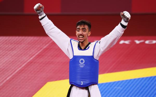 Mohamed Khalil Jendoubi 1 Atlet taekwondo Tunisia Mohamed Khalil Jendoubi disebut mirip gelandang MU Bruno Fernandes. (Foto: Reuters)