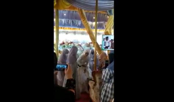 Tangkapan layar pesta pernikahan di Pesantren Darul Arifin yang digelar saat PPKM Level 4.