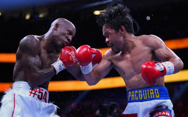 Manny Pacquiao Manny Pacquiao membocorkan penyebab dirinya kalah dari petinju Kuba, Yordenis Ugas dalam perebutan gelar juara kelas welter WBA, Minggu (22/8/2021) pagi WIB. (Reuters)
