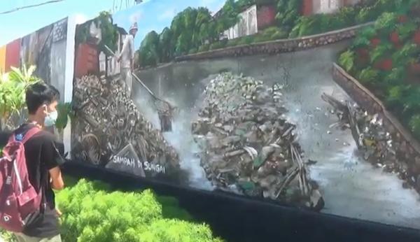 Mural kritik sosial di Klungkung, Bali. (Foto: iNews/Juli Arsana)