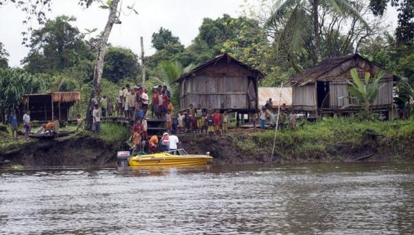 Perahu Motor di Sawa Erna, Kabupaten Asmat, Papua, yang masuk kawasan Taman Nasional Lorentz (/mimika.imigrasi.go.id/Tara Cain/Ist)