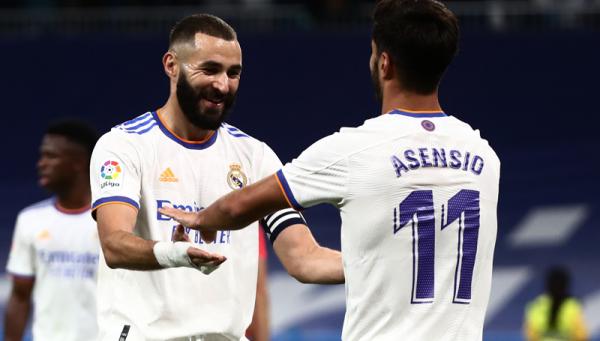 Duet Karim Benzema dan Marco Asensio tokcer dan membawa Real Madrid pesta gol 6-1 atas Real Mallorca. Kedua tim bersua pada jornada keenam Liga Spanyol. (Foto: REUTERS/Sergio Perez)
