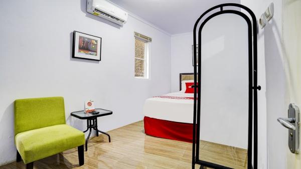 Kamar yang bersih dan modern di AR20 Guest House. (Foto: OYO)