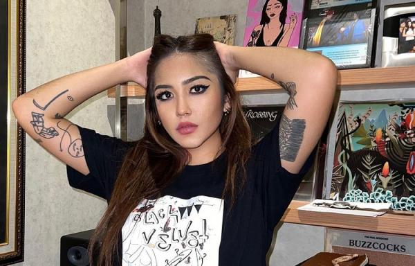 Maura Magnalia Madyaratri menyukai tato. (Foto: IG)