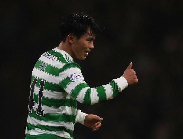 Gelandang Celtic FC asal Jepang, Reo Hatate merayakan gol kedua ke gawang Rangers dalam laga Liga Skotlandia 2021/2022 di Stadion Celtic Park, Glasgow, Kamis (3/2/2022). (Foto: REUTERS/Russell Cheyne)