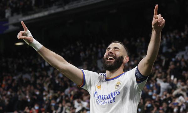 Karim Benzema Karim Benzema mencetak hattrick dan membawa Real Madrid menang 3-1 atas Paris Saint-Germain (PSG) pada leg kedua babak 16 Besar Liga Champions. (Foto: REUTERS/Susana Vera)