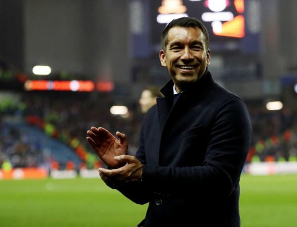 Pelatih Rangers FC, Giovanni van Bronckhorst Pelatih Rangers FC, Giovanni van Bronckhorst semringah membawa timnya melaju ke final Liga Europa 2021/2022 seusai mengalahkan RB Leipzig 3-1 di Stadion Ibrox, Jumat (6/5/2022). (Foto: REUTERS)