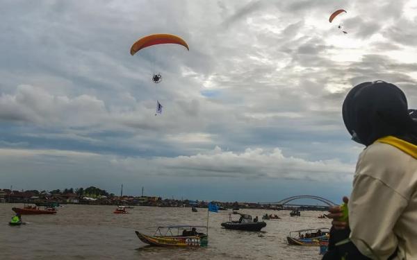 Sungai Musi Tempat liburan di Sumatera Selatan yang wajib dikunjungi Sungai Musi di Palembang. (Foto: Sindonews))