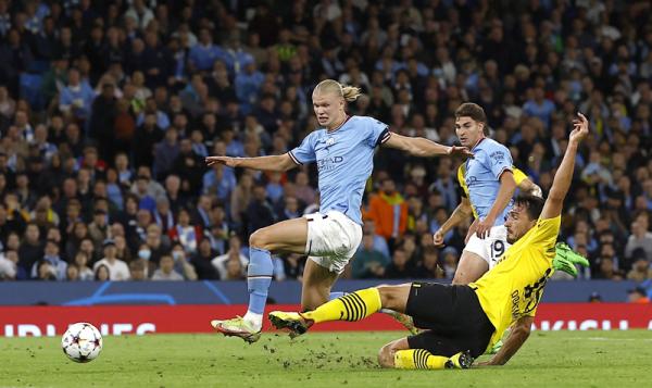 Manchester City Vs Borussia Dortmund Manchester City menang comeback 2-1 atas Borussia Dortmund pada matchday kedua Grup G Liga Champions di Etihad Stadium, Kamis (15/9/2022) dini hari WIB. (Foto: