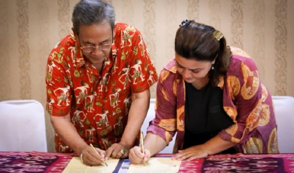 Penandatangan kemitraan antara Institut Pariwisata dan Bisnis Internasional (IPBI) dengan PT Asymmetry Movie Studio. (Foto: Ist)