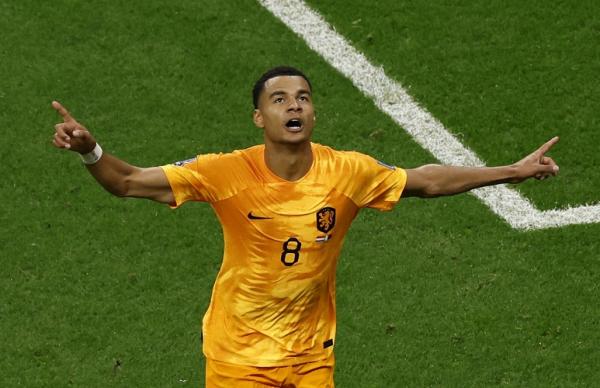 Cody Gakpo Timnas Belanda Penyerang Timnas Belanda, Cody Gakpo merayakan gol ke gawang Qatar pada laga Grup A Piala Dunia 2022 di Stadion Al Bayt, Rabu (30/11/2022). (Foto: REUTERS)