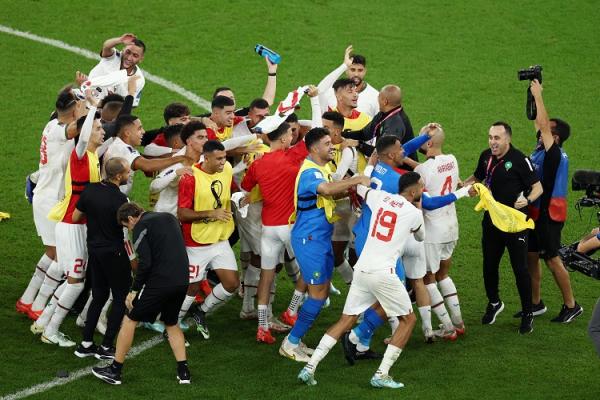Maroko Maroko lolos ke 16 besar Piala Dunia 2022 usai mengalahkan Kanada 2-0 di pertandingan terakhir F Piala Dunia 2022. Maroko lolos jadi juara grup. (foto: REUTERS).
