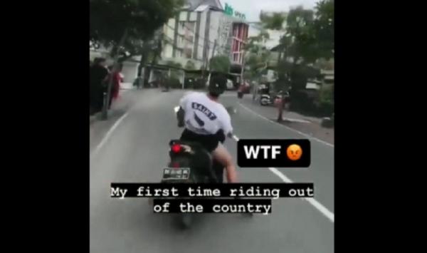 Tangkapan layar video bule berkendara ugal-ugalan di Bali. (Foto: Twitter @gusbaster87)