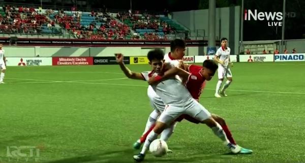 Singapura vs Vietnam Piala AFF 2022 Singapura (merah) melawan Vietnam pada laga Grup B Piala AFF 2022 di Stadion Jalan Besar, Kallang, Jumat (30/12/2022). (Foto: RCTI+)