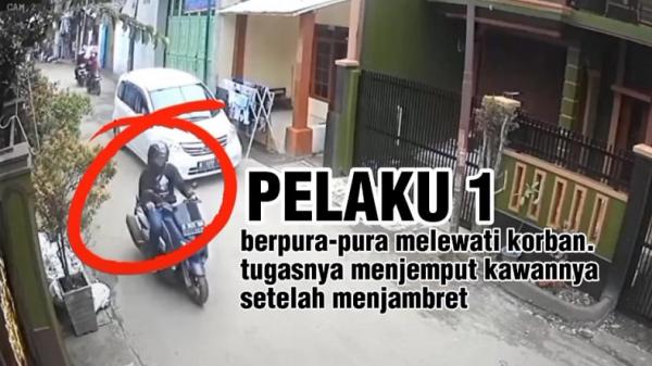 Pelaku yang menjemput pelaku lain setelah berhasil merampas tas berisi uang. (FOTO: tangkapan layar video viral/INSTAGRAM)